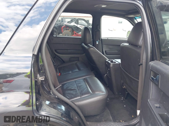 2010 Ford Escape Limited z VIN 1FMCU9EGXAKA05848, wystawiony jako IAAI lot #42381089 z przebiegiem 183 442 mil mil oraz . Historia ofert i sprzedaży dostępna na DreamBid. Obrazek 8.