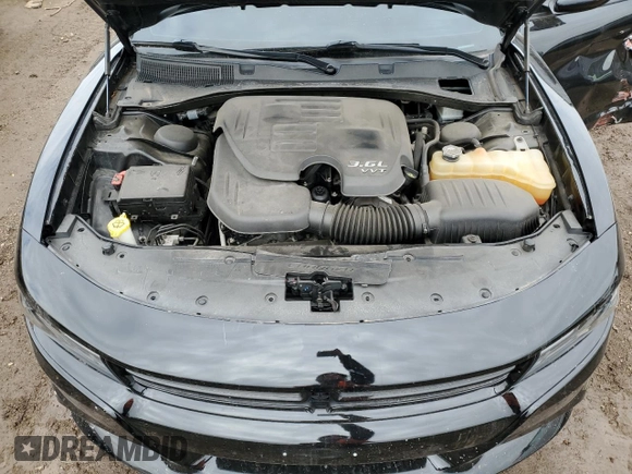 2017 Dodge Charger SXT with VIN 2C3CDXHG6HH606426, listed as a Copart auction lot 52100185 with 122,910 mi miles and Salvage Title. Bid and sale history available at DreamBid. Image 11.