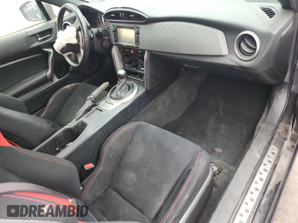 2015 Scion FR-S z VIN JF1ZNAA12F8711821, wystawiony jako Copart lot #59886505 z przebiegiem 115 796 mil mil oraz Szkoda całkowita • Salvage title. Historia ofert i sprzedaży dostępna na DreamBid. Obrazek 8.