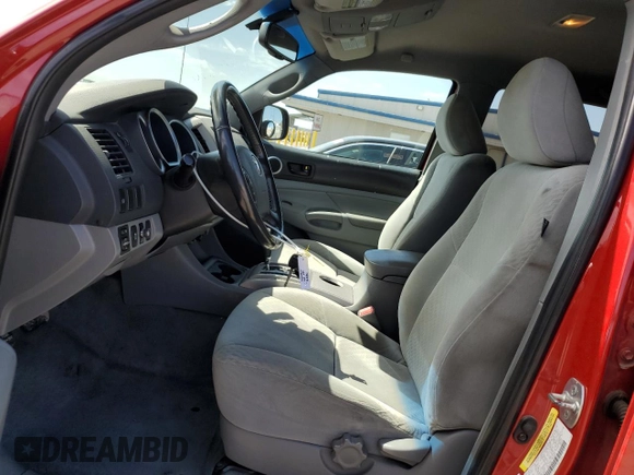 2010 Toyota Tacoma PreRunner with VIN 3TMKU4HN6AM025522, listed as a Copart auction lot 49092095 with 261,795 mi miles and Salvage title. Bid and sale history available at DreamBid. Image 7.