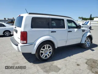 2011 Dodge Nitro Heat z VIN 1D4PT4GK6BW600092, wystawiony jako Copart lot #57296515 z przebiegiem 88 464 mil mil oraz Szkoda całkowita • Salvage title. Historia ofert i sprzedaży dostępna na DreamBid. Obrazek 3.