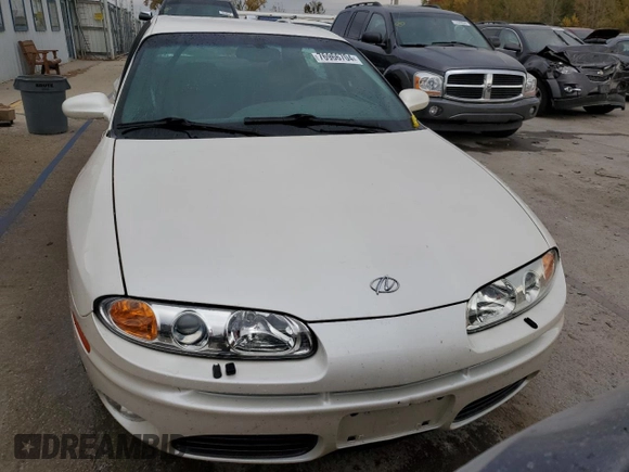 2003 Oldsmobile Aurora z VIN 1G3GS64C834100084, wystawiony jako Copart lot #76966704 z przebiegiem 70 263 mil mil oraz Szkody całkowita. Historia ofert i sprzedaży dostępna na DreamBid. Obrazek 5.