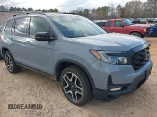 2023 Honda Passport Elite with VIN 5FNYF8H09PB001292, listed as a IAAI auction lot 41719875 with 37,537 mi miles and . Bid and sale history available at carsss.com. Image 1.