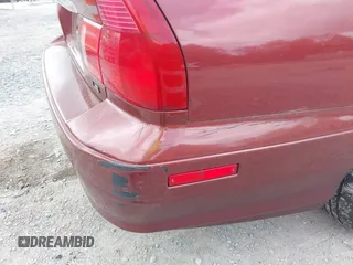 2000 Mitsubishi Diamante LS z VIN 6MMAP67P4YT003358, wystawiony jako IAAI lot #42112046 z przebiegiem 266 341 mil mil oraz . Historia ofert i sprzedaży dostępna na DreamBid. Obrazek 6.