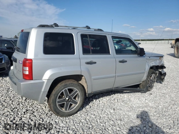 2009 Jeep Patriot with VIN 1J8FF48B49D221606, listed as a Copart auction lot 49596465 with 168,305 mi miles and Salvage title. Bid and sale history available at DreamBid. Image 3.