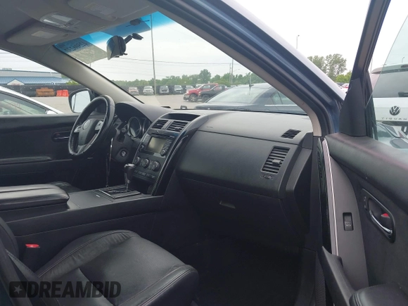 2015 Mazda CX-9 Touring with VIN JM3TB3CV9F0463819, listed as a IAAI auction lot 42506237 with 207,418 mi miles and . Bid and sale history available at DreamBid. Image 5.