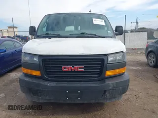 2021 GMC Savana Cargo Van with VIN 1GTW7AFP1M1307600, listed as a IAAI auction lot 41471643 with 63,565 mi miles. Bid and sale history available at carsss.com. Image 12.