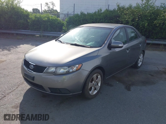 2010 Kia Forte EX z VIN KNAFU4A2XA5242981, wystawiony jako IAAI lot #42213767 z przebiegiem 174 155 mil mil oraz . Historia ofert i sprzedaży dostępna na DreamBid. Obrazek 2.
