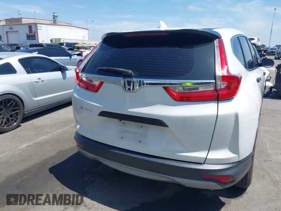 2019 Honda CR-V LX with VIN 2HKRW5H33KH407463, listed as a IAAI auction lot 42034584 with 85,454 mi miles and . Bid and sale history available at DreamBid. Image 17.