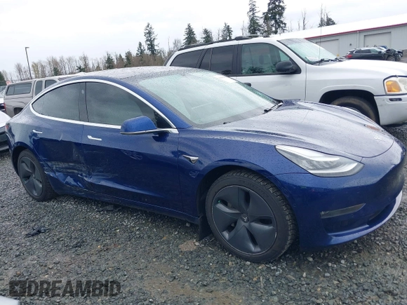 2019 Tesla Model 3 Long Range with VIN 5YJ3E1EB8KF512950, listed as a IAAI auction lot 41836349 with 55,607 mi miles and . Bid and sale history available at DreamBid. Image 6.
