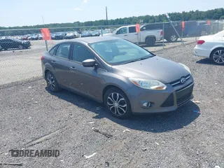 2012 Ford Focus SE with VIN 1FAHP3F24CL404341, listed as a IAAI auction lot 42831473 with 101,432 mi miles and . Bid and sale history available at DreamBid. Image 1.