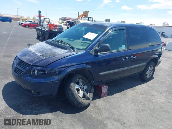2005 Dodge Caravan SXT with VIN 1D8GP45R65B280660, listed as a IAAI auction lot 42169027 with 246,407 mi miles and . Bid and sale history available at carsss.com. Image 12.