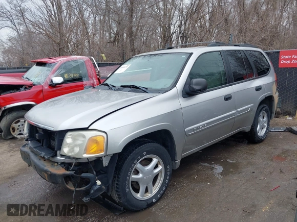 2005 GMC Envoy SLE with VIN 1GKDT13S552332088, listed as a IAAI auction lot 41699178 with 196,869 mi miles. Bid and sale history available at carsss.com. Image 18.