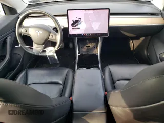 2018 Tesla Model 3 Long Range Battery z VIN 5YJ3E1EB3JF086972, wystawiony jako Copart lot #56290245 z przebiegiem 69 766 mil mil oraz Szkody całkowita. Historia ofert i sprzedaży dostępna na DreamBid. Obrazek 8.
