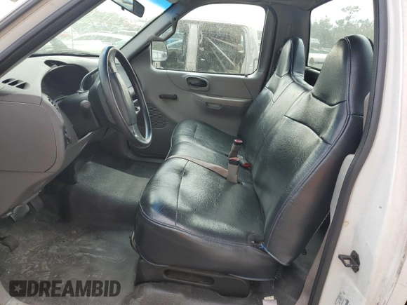 1999 Ford F-150 z VIN 1FTRF17W0XNB79739, wystawiony jako Copart lot #87840925 z przebiegiem Nie podano mil oraz Szkoda całkowita • Salvage title. Historia ofert i sprzedaży dostępna na DreamBid. Obrazek 7.