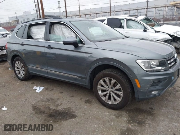 2018 Volkswagen Tiguan SEL z VIN 3VV3B7AX4JM005780, wystawiony jako IAAI lot #41880005 z przebiegiem 149 578 mil mil oraz . Historia ofert i sprzedaży dostępna na DreamBid. Obrazek 1.