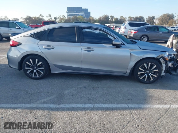 2024 Honda Civic EX-L z VIN 19XFL1H70RE022707, wystawiony jako IAAI lot #41852356 z przebiegiem 23 137 mil mil oraz . Historia ofert i sprzedaży dostępna na DreamBid. Obrazek 13.