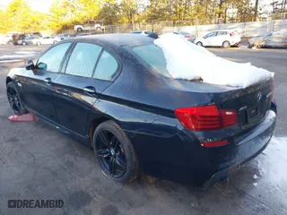 2015 BMW 5 Series 535i xDrive with VIN WBA5B3C55FD548566, listed as a IAAI auction lot 38795042 with 67,985 mi miles. Bid and sale history available at carsss.com. Image 3.