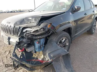 2019 Jeep Cherokee Trailhawk Elite with VIN 1C4PJMBX4KD385796, listed as a IAAI auction lot 41557577 with 55,700 mi miles. Bid and sale history available at carsss.com. Image 6.