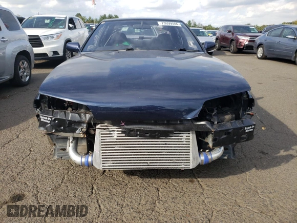 1989 Nissan Skyline z VIN HNR32002973, wystawiony jako Copart lot #73699504 z przebiegiem 72 824 mil mil oraz Szkoda całkowita • Salvage title. Historia ofert i sprzedaży dostępna na DreamBid. Obrazek 5.