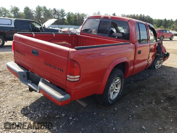 2003 Dodge Dakota Sport with VIN 1D7HL38X63S122194, listed as a Copart auction lot 58235722 with 0 mi miles and Non Repairable. Bid and sale history available at carsss.com. Image 4.