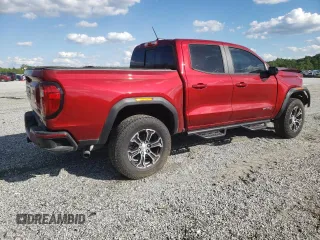 2024 GMC Canyon 4WD AT4 with VIN 1GTP6DEK3R1149427, listed as a Copart auction lot 55827855 with 12,411 mi miles and Salvage Title. Bid and sale history available at carsss.com. Image 3.