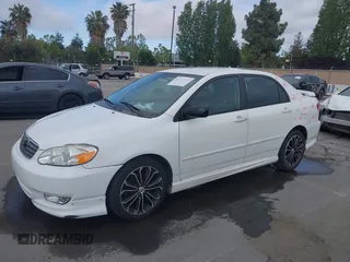 2004 Toyota Corolla CE with VIN JTDBR32E440052035, listed as a IAAI auction lot 42218301 with 299,999 mi miles. Bid and sale history available at carsss.com. Image 2.