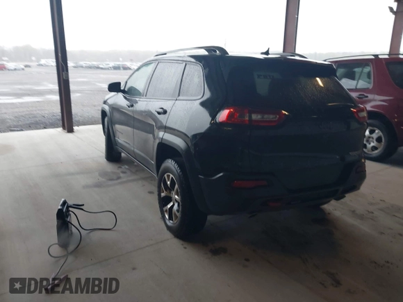 2014 Jeep Cherokee Trailhawk with VIN 1C4PJMBS3EW150366, listed as a IAAI auction lot 41971035 with 90,994 mi miles. Bid and sale history available at carsss.com. Image 3.