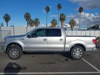 2014 Ford F-150 XL with VIN 1FTFW1ET8EFB76414, listed as a IAAI auction lot 41526371 with 150,272 mi miles. Bid and sale history available at carsss.com. Image 15.