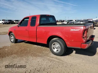 2001 Ford F-150 XL with VIN 1FTZX17211NB16120, listed as a Copart auction lot 54884765 with 124,196 mi miles and Salvage title. Bid and sale history available at DreamBid. Image 2.