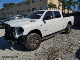 2020 Ram 2500 Big Horn with VIN 3C6UR5DL0LG132708, listed as a Copart auction lot 49206745 with 124,512 mi miles and Salvage Title. Bid and sale history available at carsss.com. Image 1.