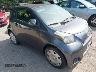 2012 Scion iQ z VIN JTNJJXB00CJ016314, wystawiony jako IAAI lot #42565868 z przebiegiem 68 497 mil mil oraz . Historia ofert i sprzedaży dostępna na DreamBid. Obrazek 1.