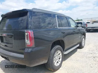 2015 GMC Yukon SLT with VIN 1GKS2BKC5FR275085, listed as a IAAI auction lot 42025693 with Not Provided miles. Bid and sale history available at carsss.com. Image 4.