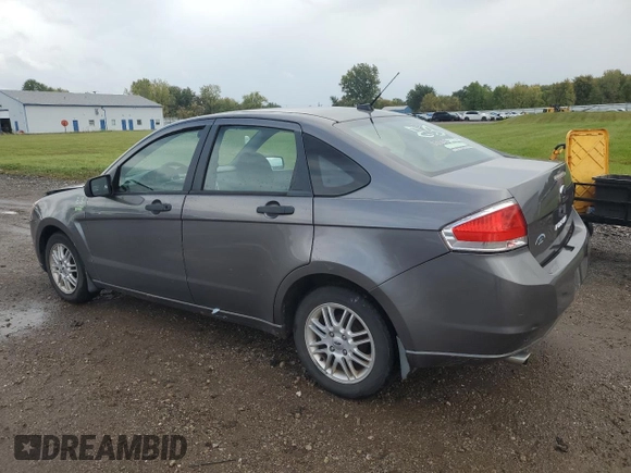 2009 Ford Focus SE with VIN 1FAHP35N39W258484, listed as a Copart auction lot 72679704 with 88,824 mi miles and Salvage Title. Bid and sale history available at DreamBid. Image 2.