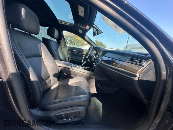 2013 BMW 7 Series 740i with VIN WBAYA6C55DC995225, listed as a Copart auction lot 76207974 with 126,648 mi miles and Clean Title. Bid and sale history available at carsss.com. Image 5.