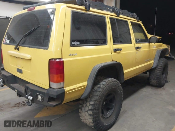 2001 Jeep Cherokee Sport with VIN 1J4FF48S41L580319, listed as a IAAI auction lot 42064564 with 257,534 mi miles and . Bid and sale history available at DreamBid. Image 4.