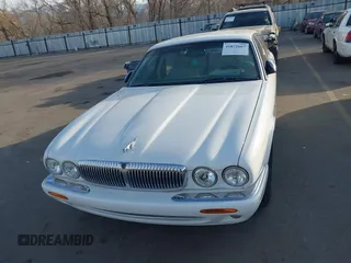 1998 Jaguar XJ Vanden Plas with VIN SAJKX6241WC829353, listed as a IAAI auction lot 41872667 with Not Provided miles and . Bid and sale history available at DreamBid. Image 6.
