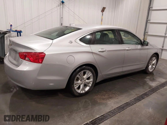 2014 Chevrolet Impala LT with VIN 2G1115SL4E9250806, listed as a IAAI auction lot 42119330 with 98,618 mi miles and . Bid and sale history available at DreamBid. Image 4.