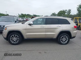 2014 Jeep Grand Cherokee Limited z VIN 1C4RJFBG8EC408754, wystawiony jako IAAI lot #42612211 z przebiegiem 149 017 mil mil oraz . Historia ofert i sprzedaży dostępna na DreamBid. Obrazek 14.