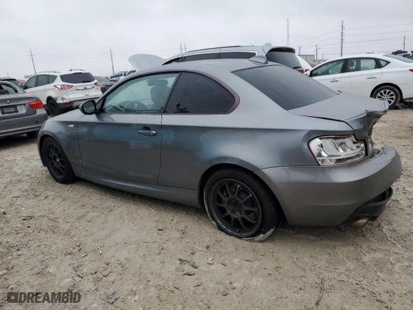 2011 BMW 1 Series 135i with VIN WBAUC9C56BVM09594, listed as a Copart auction lot 44166375 with 0 mi miles and Salvage Title. Bid and sale history available at carsss.com. Image 2.