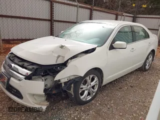 2012 Ford Fusion SE z VIN 3FAHP0HA3CR285217, wystawiony jako IAAI lot #41792353 z przebiegiem 190 916 mil mil oraz . Historia ofert i sprzedaży dostępna na DreamBid. Obrazek 14.