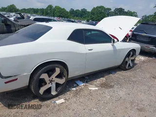 2012 Dodge Challenger SXT Plus z VIN 2C3CDYAG3CH168263, wystawiony jako IAAI lot #42283885 z przebiegiem 200 052 mil mil oraz . Historia ofert i sprzedaży dostępna na DreamBid. Obrazek 14.