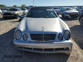 2002 Mercedes-Benz CLK 320/430 with VIN WDBLK70GX2T106873, listed as a Copart auction lot 71202824 with 140,233 mi miles and Salvage Title. Bid and sale history available at DreamBid. Image 5.