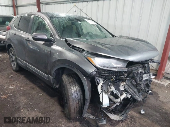 2018 Honda CR-V EX with VIN 7FARW2H56JE043542, listed as a IAAI auction lot 41560270 with 104,237 mi miles and . Bid and sale history available at DreamBid. Image 1.