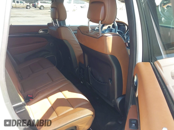 2015 Jeep Grand Cherokee Summit with VIN 1C4RJFJG1FC797711, listed as a IAAI auction lot 42026431 with 101,075 mi miles and . Bid and sale history available at DreamBid. Image 8.