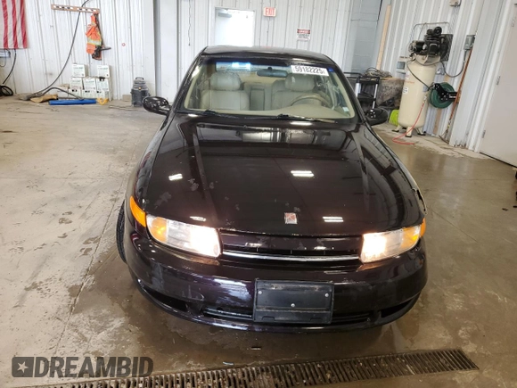 2000 Saturn LS z VIN 1G8JU52FXYY601270, wystawiony jako Copart lot #59182225 z przebiegiem 262 220 mil mil oraz Nie do naprawy • Non repairable. Historia ofert i sprzedaży dostępna na DreamBid. Obrazek 5.