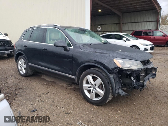 2013 Volkswagen Touareg Lux with VIN WVGEF9BP0DD002814, listed as a Copart auction lot 83015434 with 143,320 mi miles and Salvage Title. Bid and sale history available at DreamBid. Image 4.