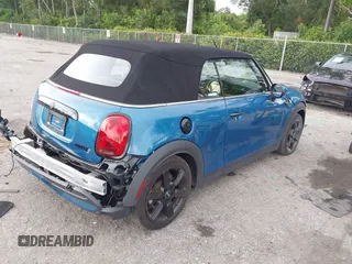 2022 MINI Convertible Cooper S z VIN WMW43DL06N3P19784, wystawiony jako IAAI lot #42635816 z przebiegiem 17 053 mil mil oraz . Historia ofert i sprzedaży dostępna na DreamBid. Obrazek 4.