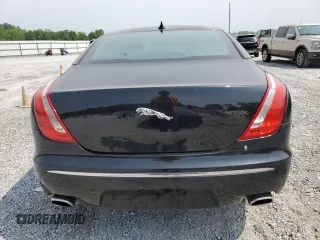 2014 Jaguar XJ with VIN SAJWA2GZ7E8V60213, listed as a Copart auction lot 53382454 with 88,870 mi miles and Salvage Title. Bid and sale history available at carsss.com. Image 6.