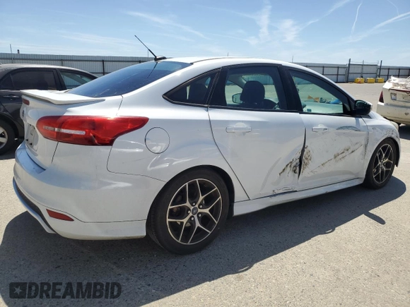 2016 Ford Focus SE with VIN 1FADP3F22GL329241, listed as a Copart auction lot 58095135 with 105,079 mi miles and Salvage title. Bid and sale history available at DreamBid. Image 3.